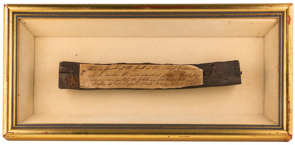 Captain James Cook's H.M. Bark Endeavour, a piece of timber (22cm long x 2cm wide) being part of the keel retrieved from the wreck of the ship at Newport, Rhode Island, USA., in a gilt timber framed display case with label attached, written in 18th century hand (probably that of Sir Joseph Bank's sister, Sarah) that reads, 'This is part of the keel of the Ship Endeavour which, under the command of James Cook, Esq, circumnavigated the Globe in 1768-1770, Broken up at Newport, Rhode-Island, U.S.A. 1796.' There are only two pieces of this historic ship in private hands, this one and the other is in a Sydney Collection, excessively rare and of the highest importance to Australian history.