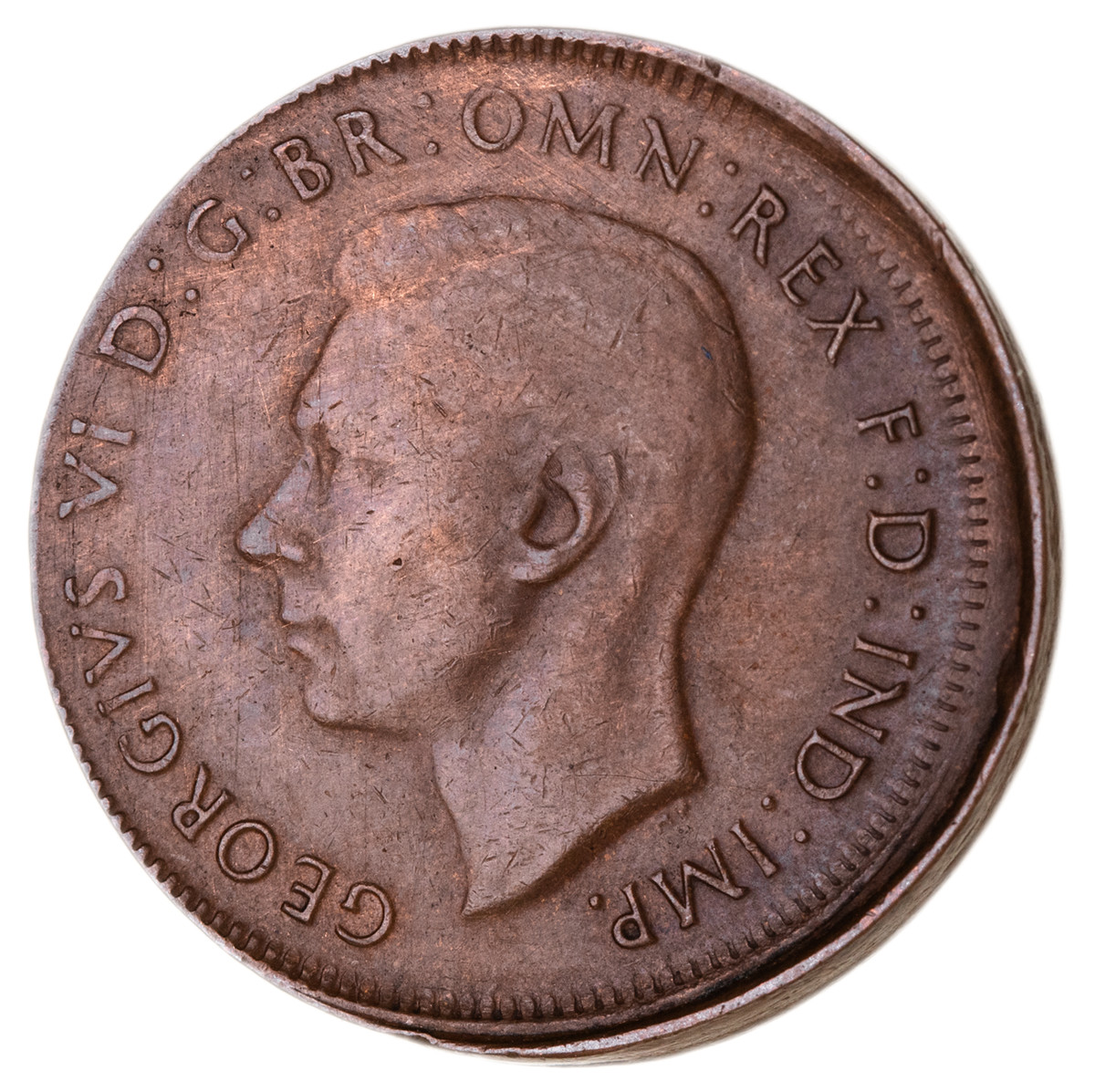 44 · MIS-STRIKES: George VI, halfpenny, 1948Y. struck 10 percent off centre.