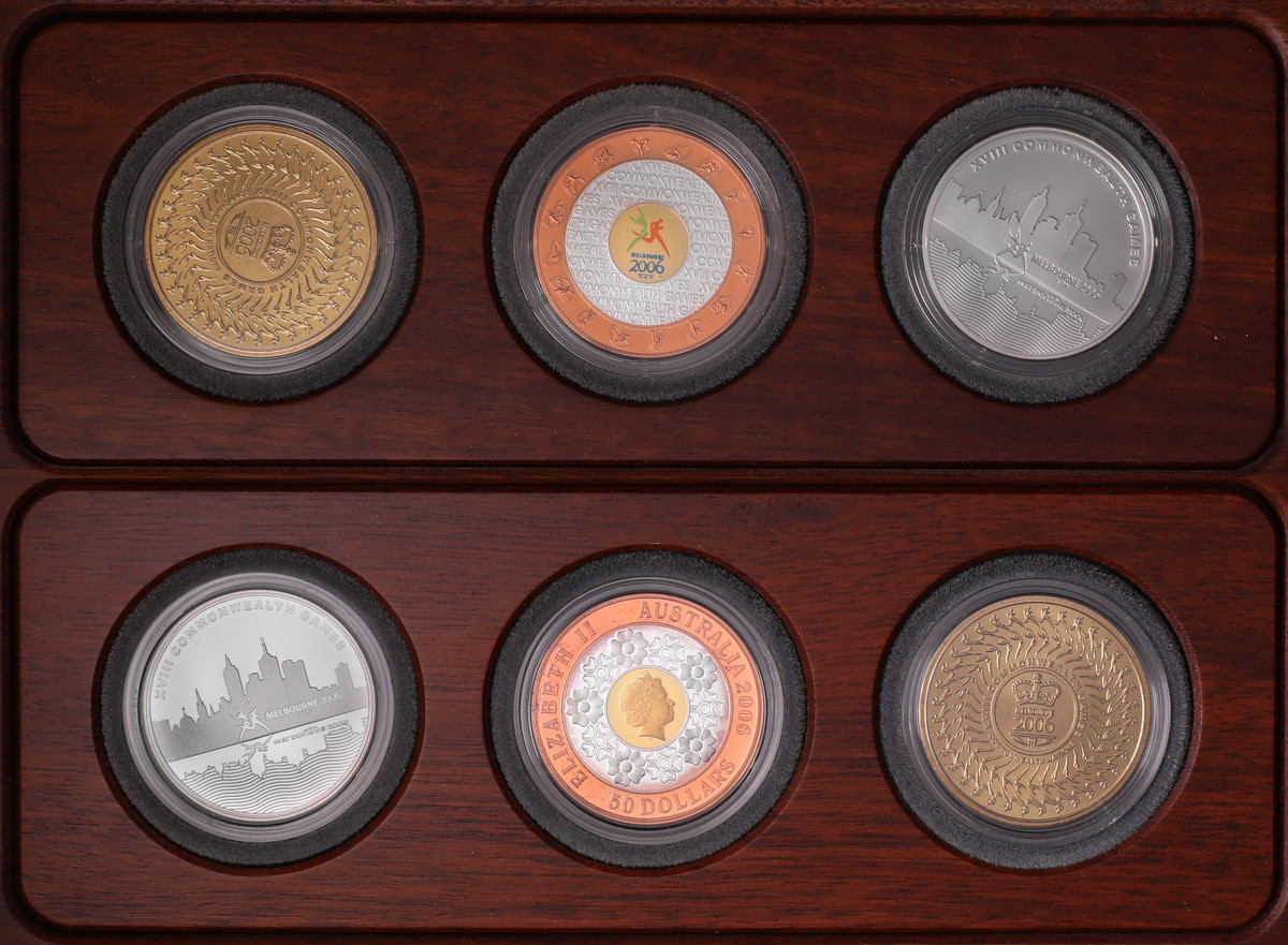 DECIMAL PROOFS: Elizabeth II, proof three coin sets, tri-metal (gold is plated) fifty dollars and silver twenty dollars, bronze five dollars, XVII Commonwealth Games Melbourne, 2006. (2)