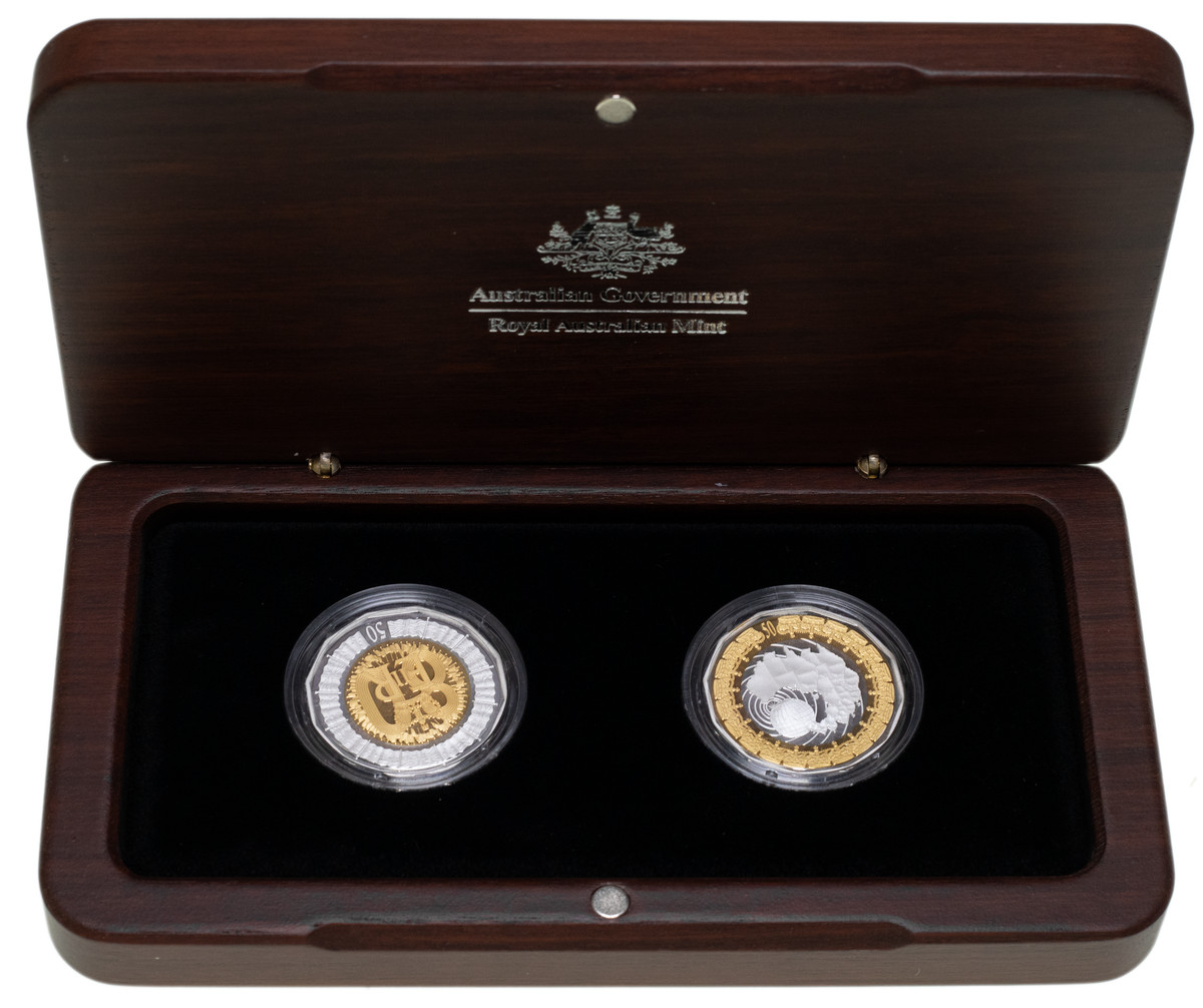 DECIMAL PROOFS: Elizabeth II, fifty cents in .999 fine silver with selective gold plating, two coins in each set, Royal Collection, 2006. (3)
