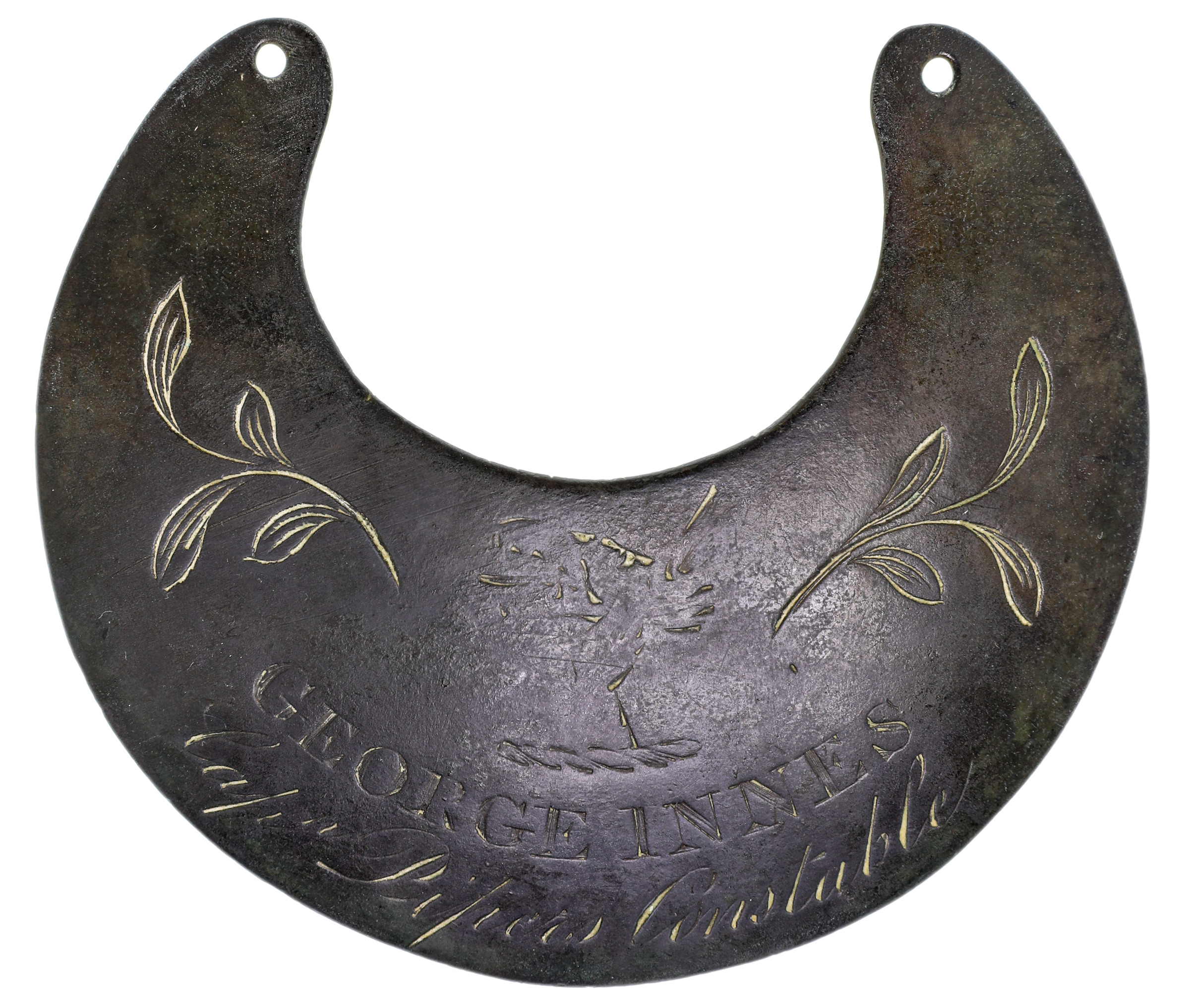 Aboriginal Breast Plate or Gorget, Sydney, (1825), in copper, (60 x 132mm), in true military gorget shape, inscribed "George Innes / Capn. Pipers Constable" in two lines, above Piper's family crest and twig decoration either side. Considerably worn and patinated, nearly fine and very rare, of great historical interest and one of the most important king plates known.